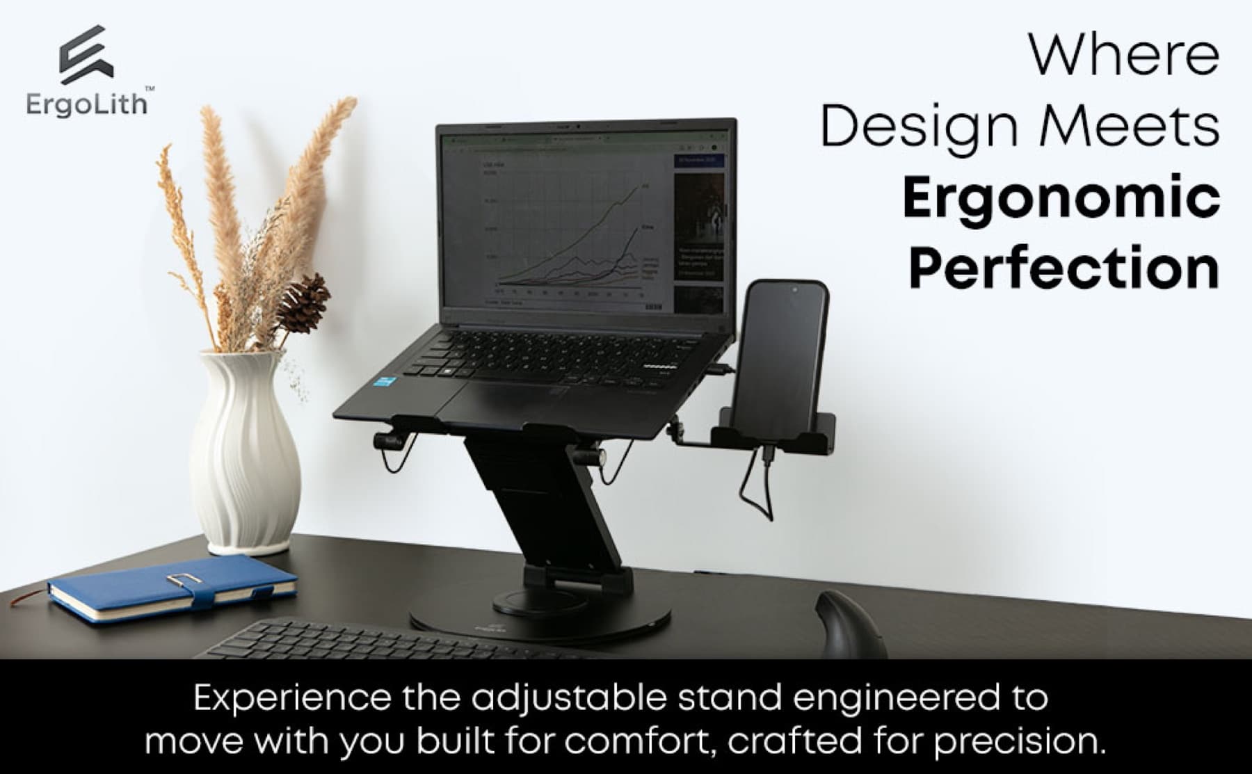 ErgoLith stand set up at a desk with a laptop and phone